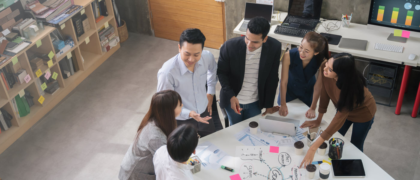 A procurement and supply chain team working together