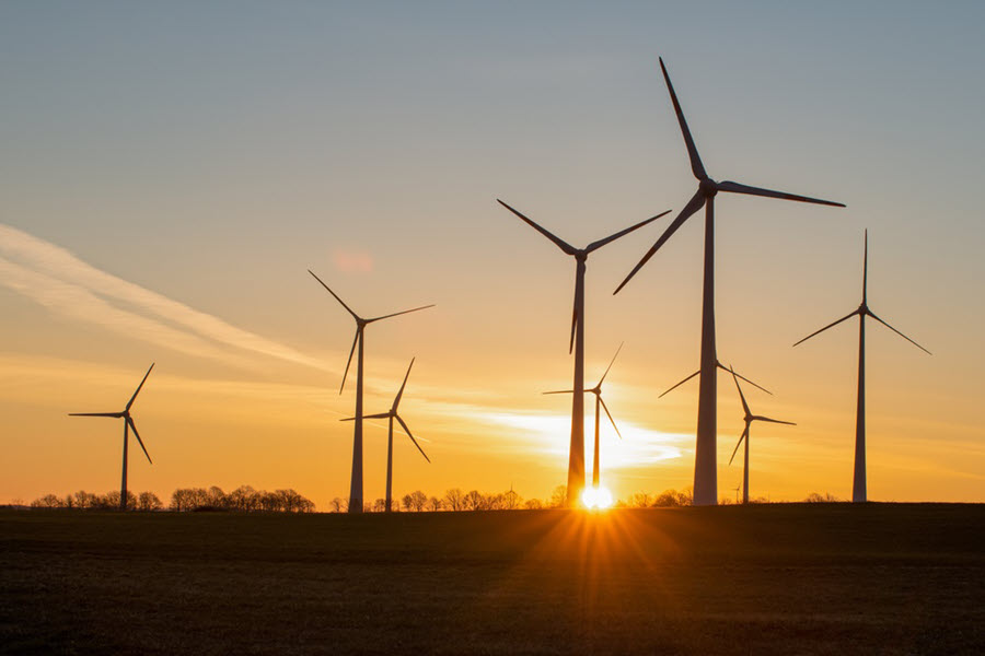 Wind turbines at sunset