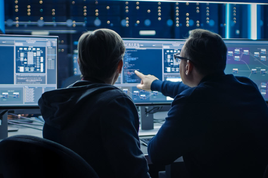 Analysts working at monitors