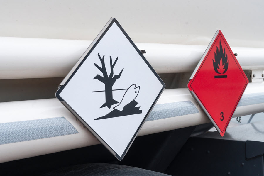 Hazard placards on a tanker truck