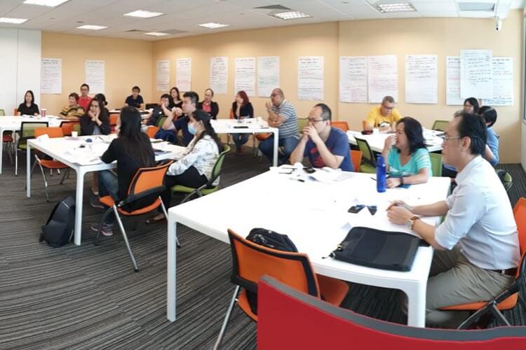 An Executive Education workshop in session at SIPMM